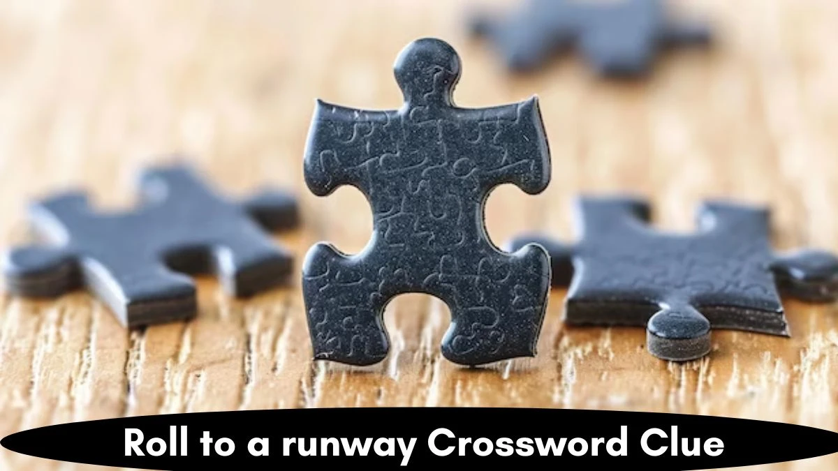 Roll to a runway Crossword Clue