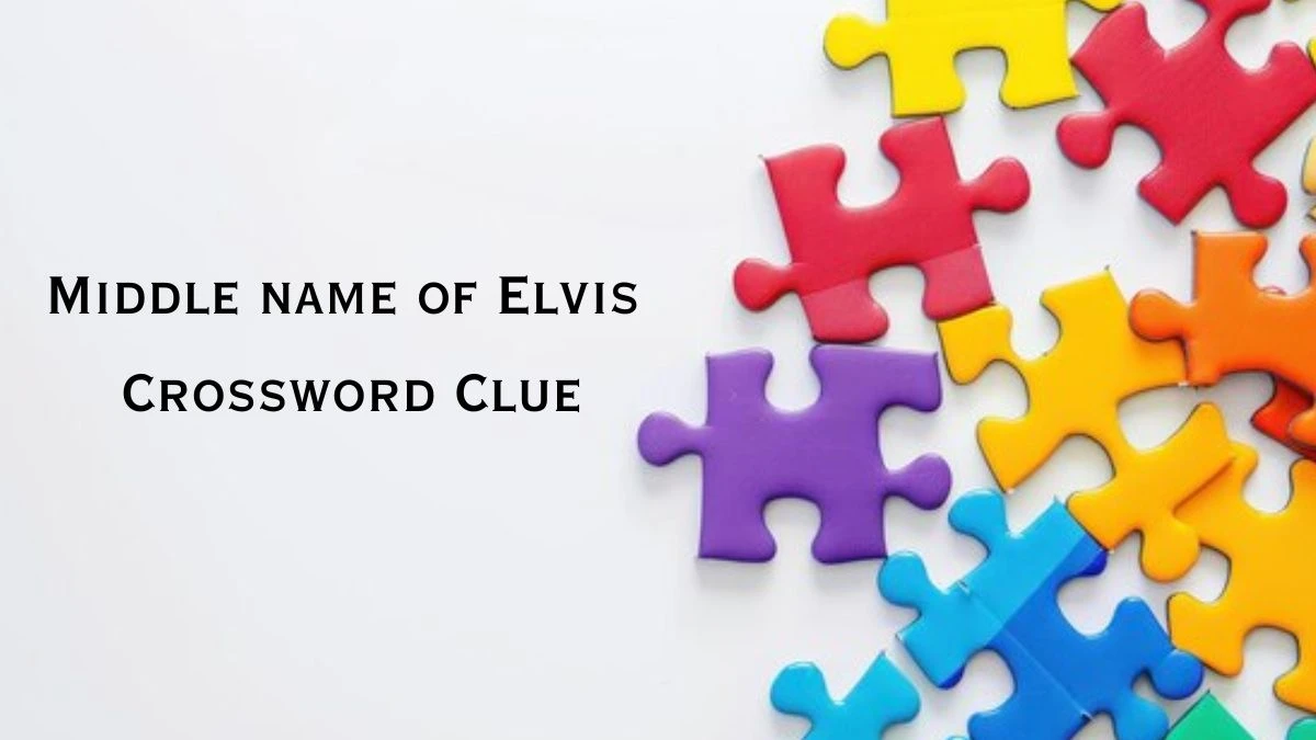 Middle name of Elvis Crossword Clue