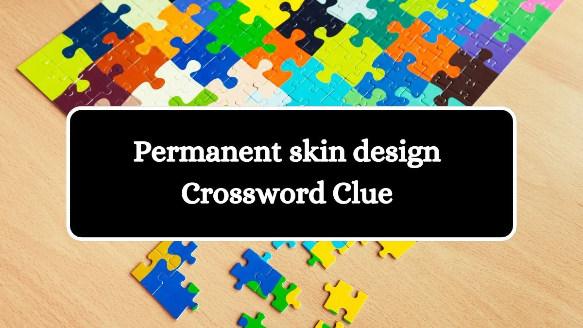 Permanent skin design Crossword Clue